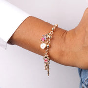 Bracciale in Metallo con pendenti impreziositi da smalti colorati a forma di mamma, family, bimba, casa e papà