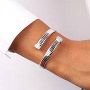 Bracciale in Metallo contrariè elasticizzato con dettaglio in zirconi bianchi