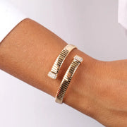 Bracciale in Metallo contrariè elasticizzato con dettaglio in zirconi bianchi