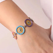 Bracciale in Metallo con ruote del carretto siciliano impreziosite da smalti colorati