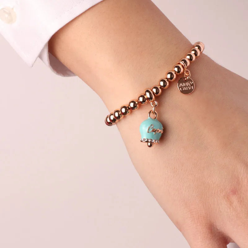 Bracciale in Metallo Bracciale con campanella portafortuna turchese e scritta Capri.
