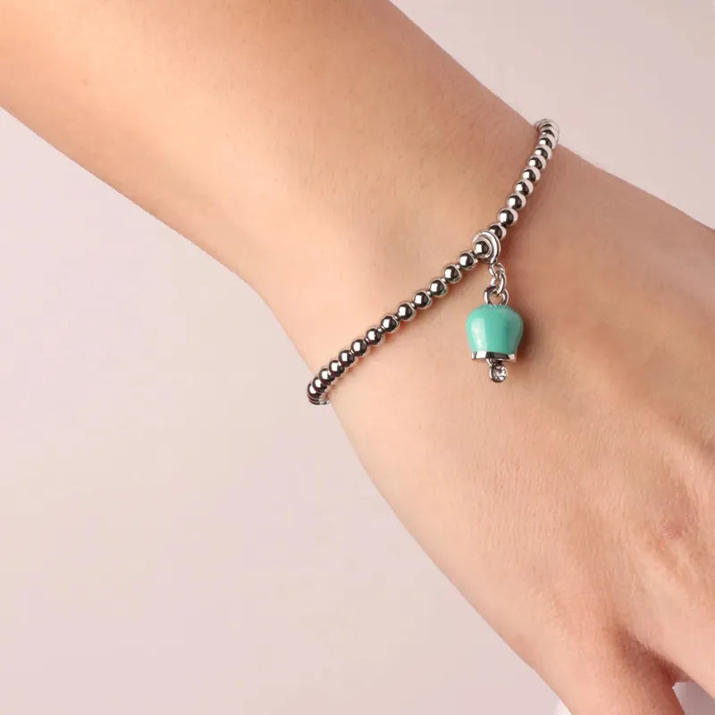Bracciale in Metallo maglia a sfere con campanella portafortuna pendente  verde acqua impreziosita da cristalli