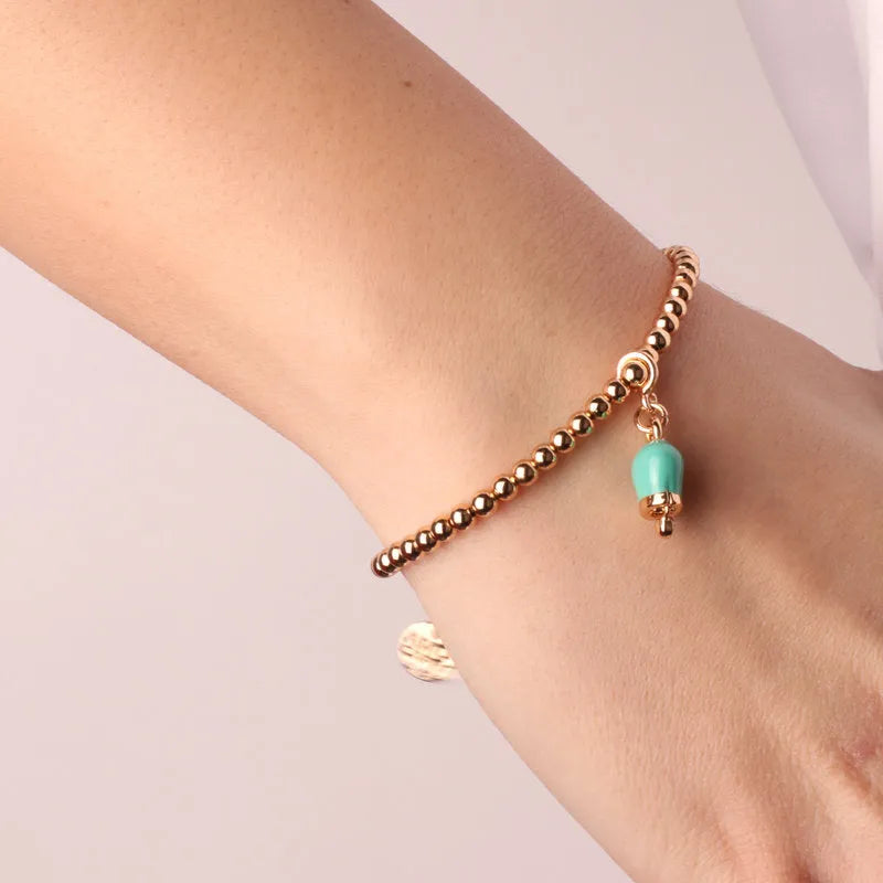 Bracciale in Metallo maglia a sfere con campanella portafortuna pendente verde acqua - BYSIMON gioielli
