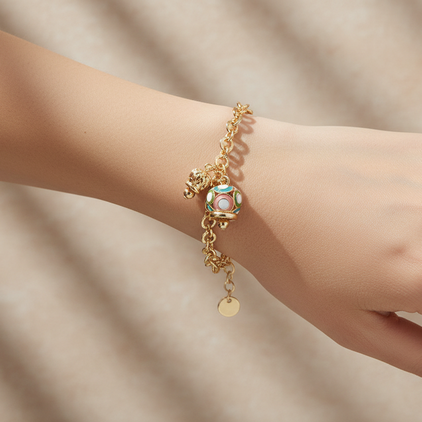 Bracciale in Metallo con campana colorata e campanella traforata a cuori - BYSIMON gioielli