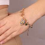Bracciale in Metallo con gufo portafortuna e cristalli verdi - BYSIMON gioielli