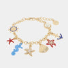 Bracciale in Metallo con stelle marine, conchiglie, ancora e timone