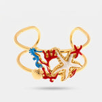 Bracciale in Metallo con stella marina, conchiglia, corallo e cavalluccio marino BYS - gioiello BySimon
