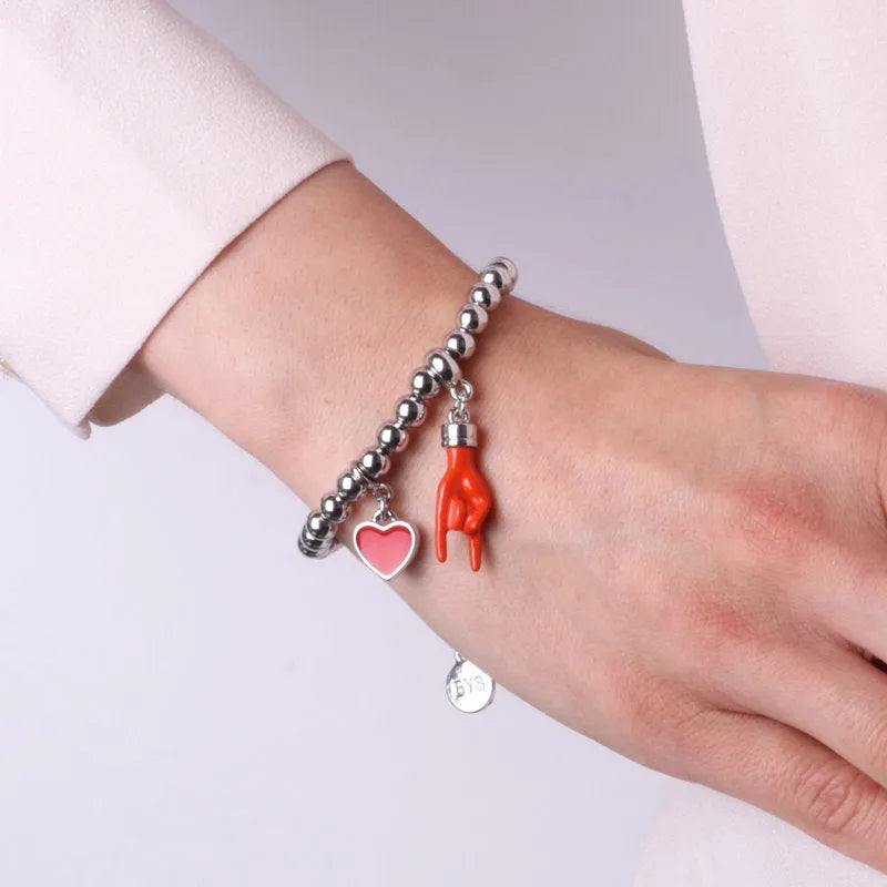 Bracciale in Metallo con pendente a forma di corna porta fortuna e cuore rosso - BYSIMON gioielli