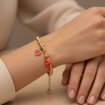 Bracciale in Metallo con pendente a forma di corna porta fortuna e cuore rosso - BYSIMON gioielli