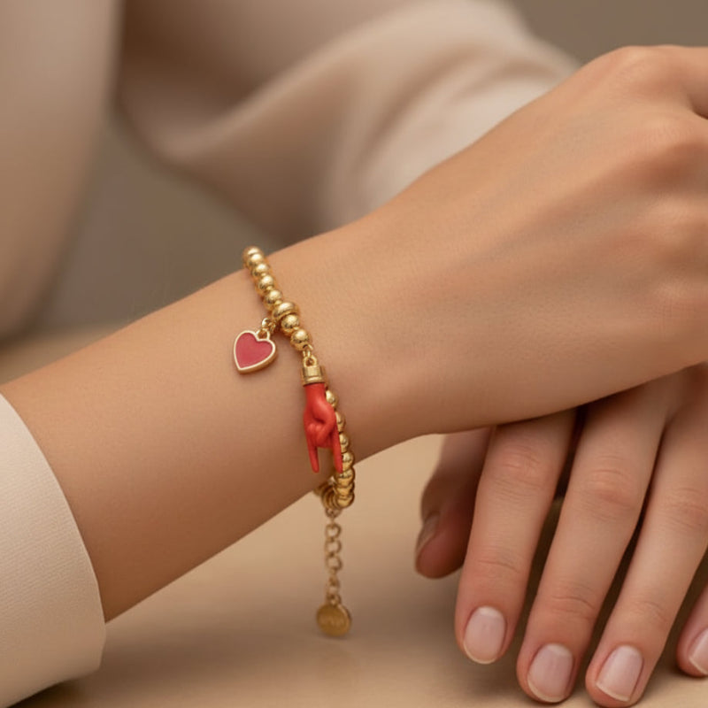 Bracciale in Metallo con pendente a forma di corna porta fortuna e cuore rosso - BYSIMON gioielli