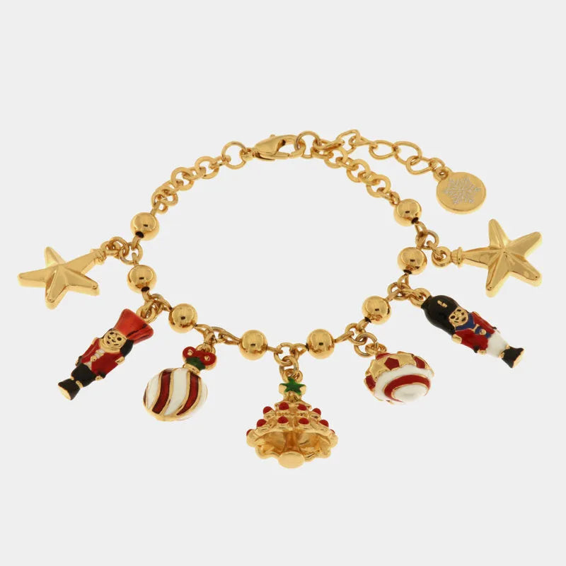 Metal bracelet with pendants in the shape of a Christmas tree, nutcracker, balls and stars