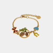 Bracciale in Metallo con pigna, fiocco e ferro di cavallo in smalto colorato