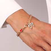 Bracciale in Metallo con chiavi intrecciate in smalto azzurro e cuore rosso
