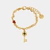 Bracciale in Metallo con chiave pendente in smalto verde