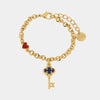 Bracciale in Metallo con chiave pendente in smalto blu
