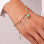 Bracciale in Metallo con campanella portafortuna in smalto turchese e cuore rosso - BYSIMON gioielli