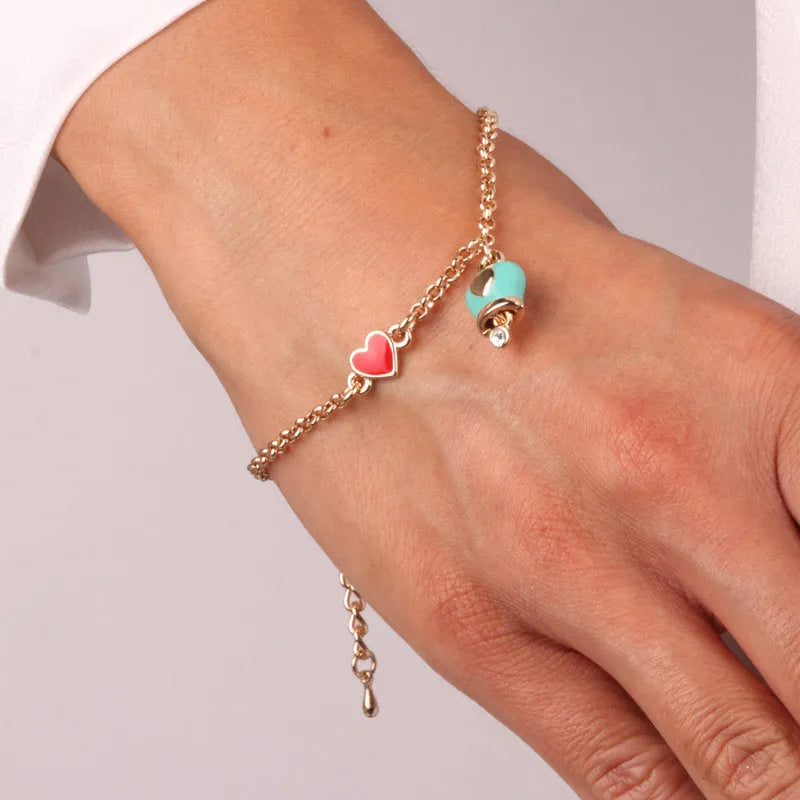 Bracciale in Metallo con campanella portafortuna in smalto turchese e cuore rosso - BYSIMON gioielli