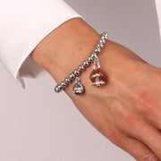 Bracciale in Metallo con campanella scritta capri pendente impreziosita da cristalli e smalto marrone