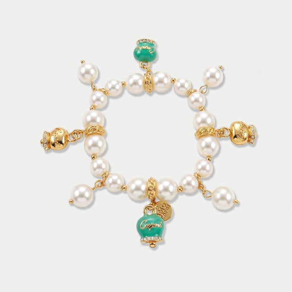 Bracciale in Metallo Bracciale in Metallo con perle e campanelle portafortuna in smalto verde con scritta Capri