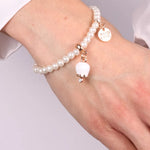 Bracciale in Metallo Bracciale in Metallo con perle e campanella portafortuna in smalto bianco - BYSIMON gioielli