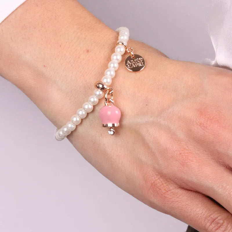 Bracciale in Metallo Bracciale in Metallo con perle e campanella portafortuna in smalto rosa - BYSIMON gioielli