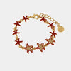 Bracciale in Metallo con stelle marine rosse