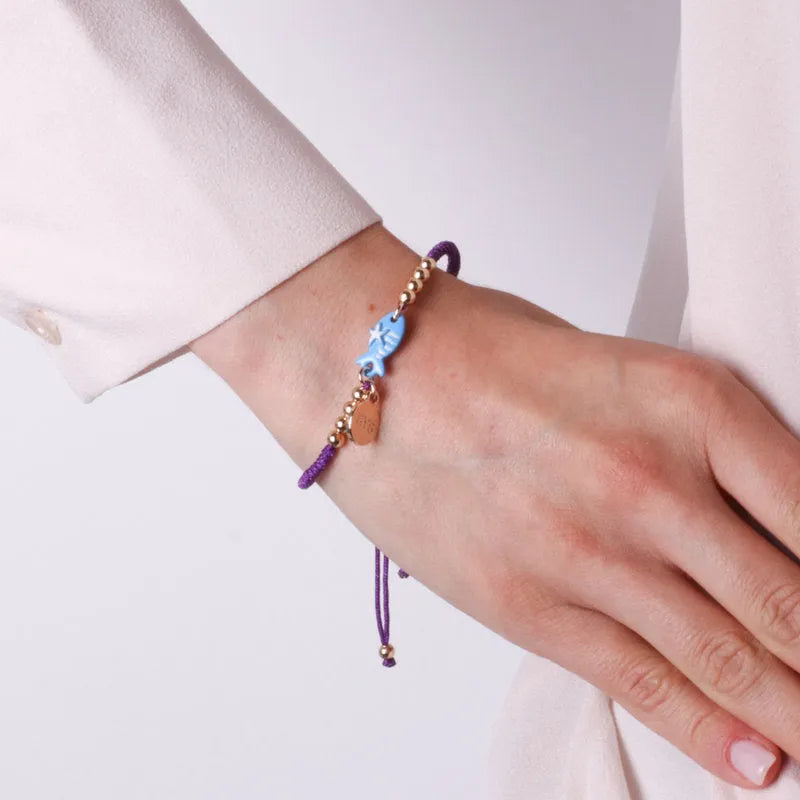 Bracciale in Metallo con cordino viola e sfere con pesciolino azzurro - BYSIMON gioielli