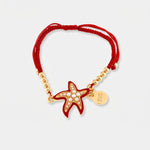 Bracciale in Metallo con cordino rosso e sfere con stella marina - BYSIMON gioielli