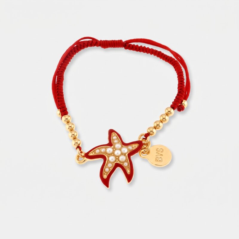 Bracciale in Metallo con cordino rosso e sfere con stella marina - BYSIMON gioielli