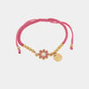 Bracciale in Metallo con cordino rosa e sfere con margherita