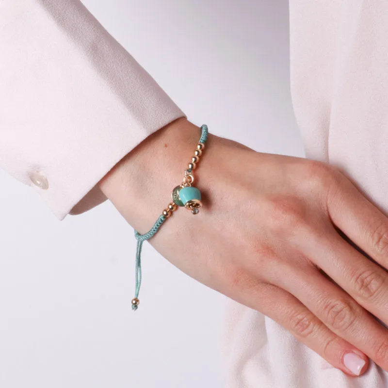 Bracciale in Metallo con cordino turchese e sfere con campanella - BYSIMON gioielli