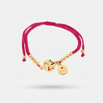 Bracciale in Metallo con cordino fucsia e trinacria - BYSIMON gioielli
