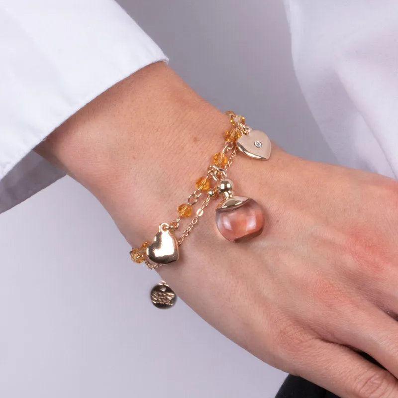 Bracciale in Metallo con profumo rosa per pietre gialle