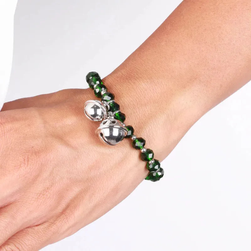 Bracciale in Metallo con sonagli e pietre verdi