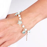 Bracciale in Metallo con conchiglia e stella marina - BYSIMON gioielli