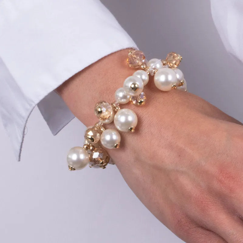 Bracciale in Metallo con perle bianche e dettagli in oro - BYSIMON gioielli