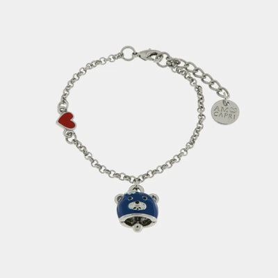 Metal bracelet with blue bear-shaped bell and red heart
