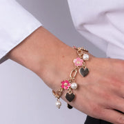 Bracciale in Metallo con fiori fucsia e cuori pendenti
