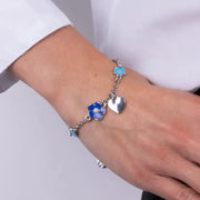 Bracciale in Metallo con fiori blu e cuore pendente