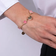 Bracciale in Metallo con fiori rosa e cuore pendente