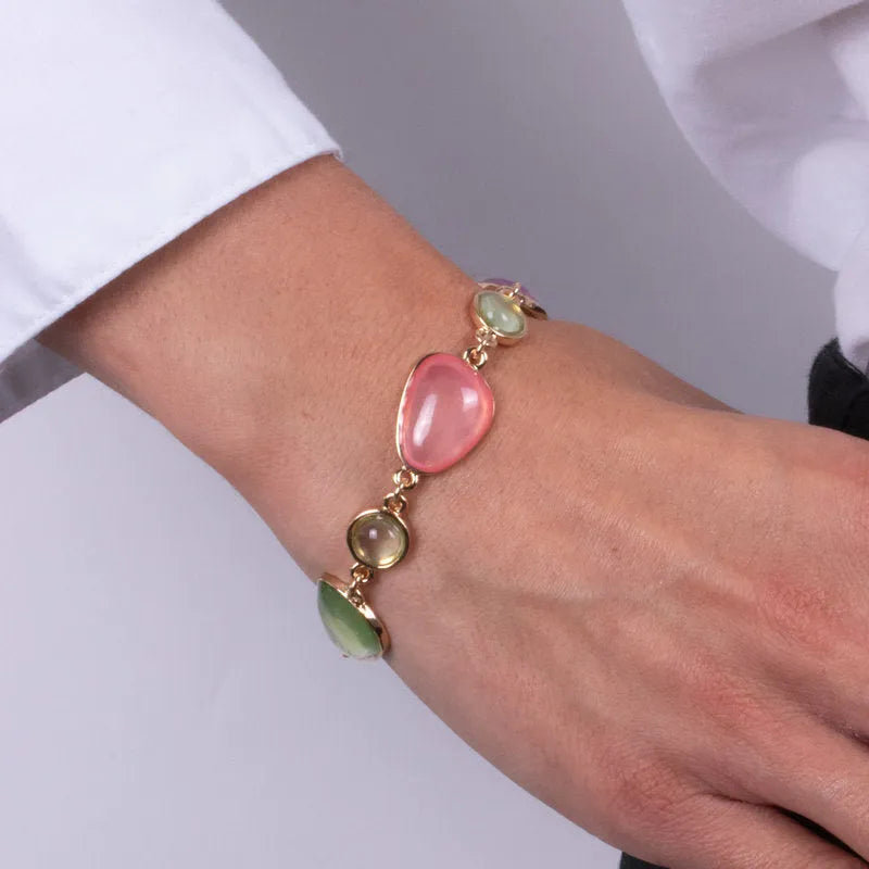 Metal bracelet with pink, green and purple teardrop crystals