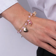 Bracciale in Metallo multifilo con pumo e pietre rosa