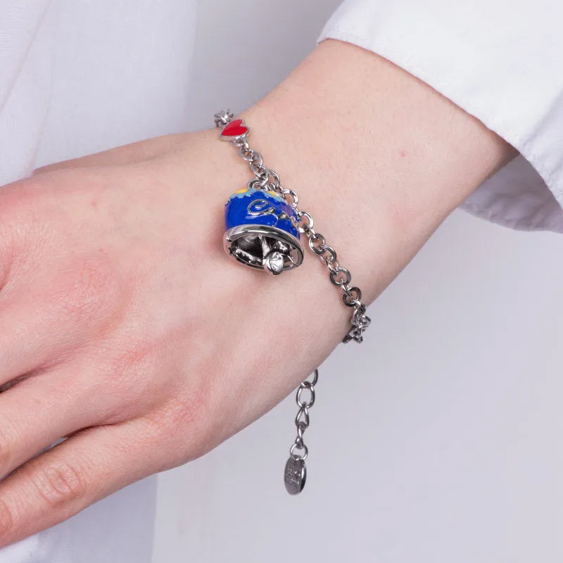 Bracciale in Metallo con campanella blu impreziosita da margherite e scritta capri