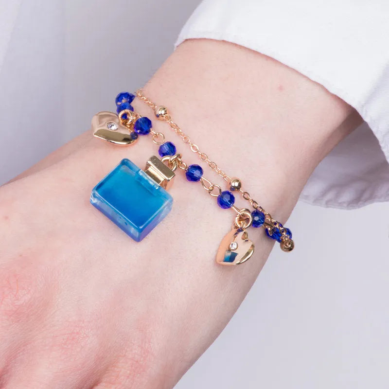 Bracciale in Metallo con perle e profumi