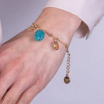 Bracciale in Metallo con pigna  turchese portafortuna e trinacria