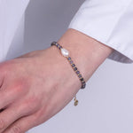 Bracciale in Metallo con pietre viola e perla