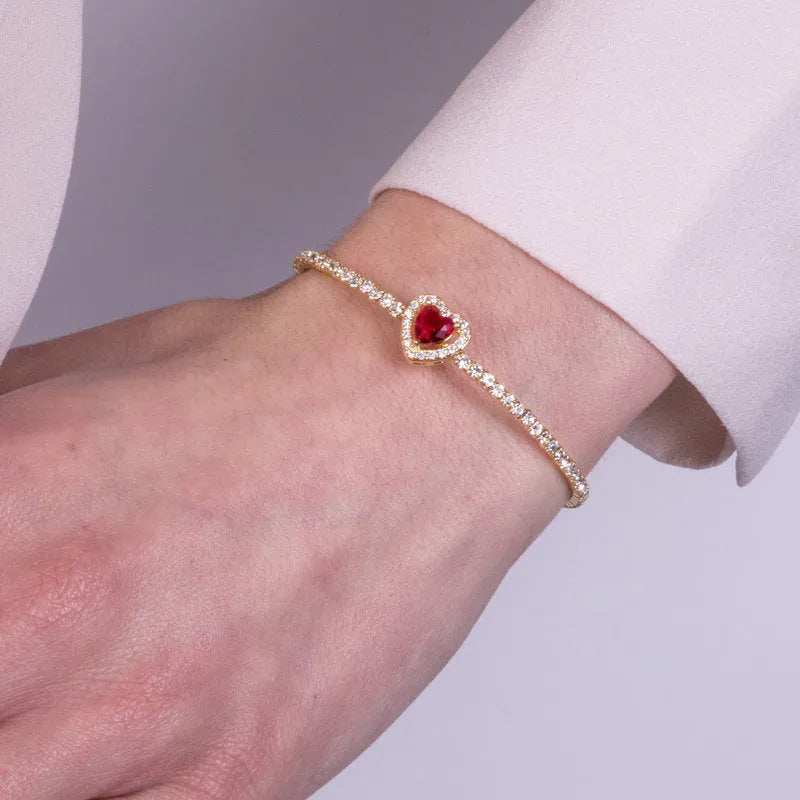 Bracciale in Metallo tennis semirigido con cristalli trasparenti e cuore rosso centrale - BYSIMON gioielli