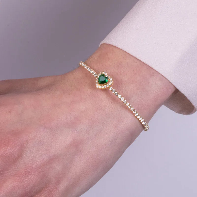 Bracciale in Metallo tennis semirigido con cristalli trasparenti e cuore verde centrale
