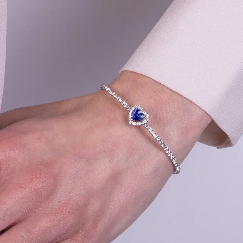 Bracciale in Metallo tennis semirigido con cristalli trasparenti e cuore viola centrale