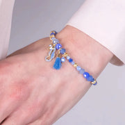 Bracciale in Metallo con sfere blu cobalto e ciondolo cavalluccio marino
